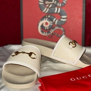 Leather upper rubber slides.